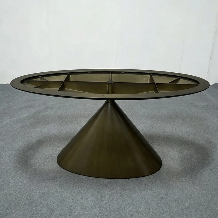 A sculptural segmented circular metal table base in dark bronze finish, featuring open cutouts and a minimalist silhouette, ideal for contemporary round tabletops - SeawaveTable