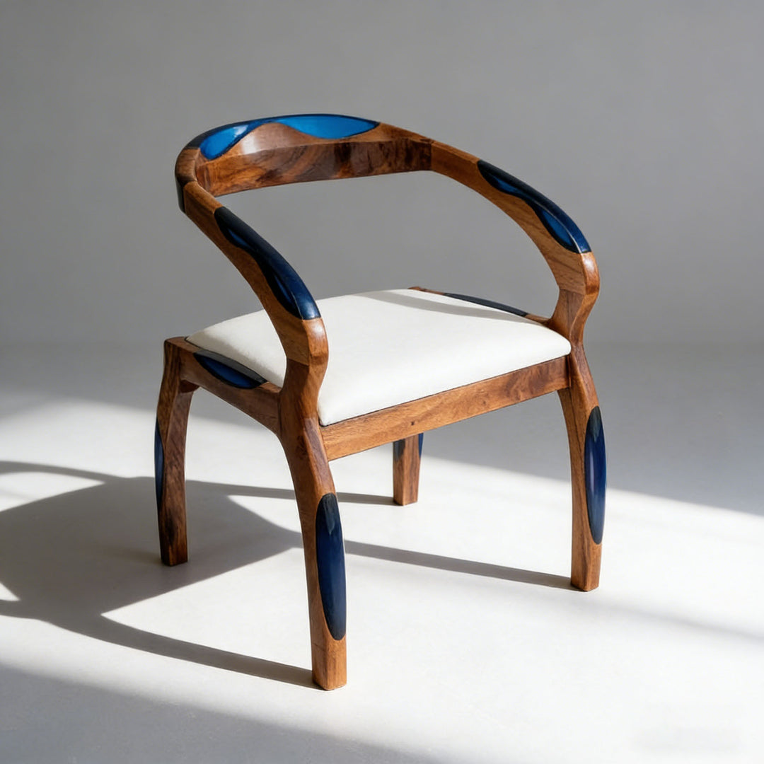 Handcrafted hardwood chair featuring ocean-inspired blue resin details