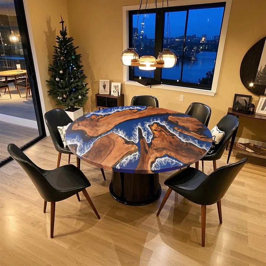 Seawavetable
Oval epoxy dining table with ocean wave resin and black walnut wood in a modern dining room.