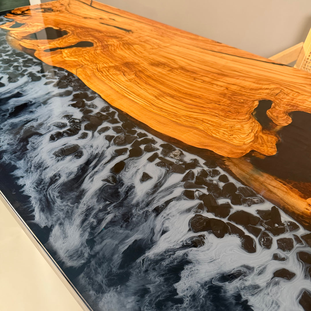 Seawavetable-Coastal-style olive wood table with clear resin waves and embedded stones