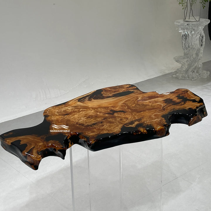 A resin coffee table display featuring cunninghamia wood with a dark resin river, showcased in a bright studio setting for interior design presentation - SeawaveTable