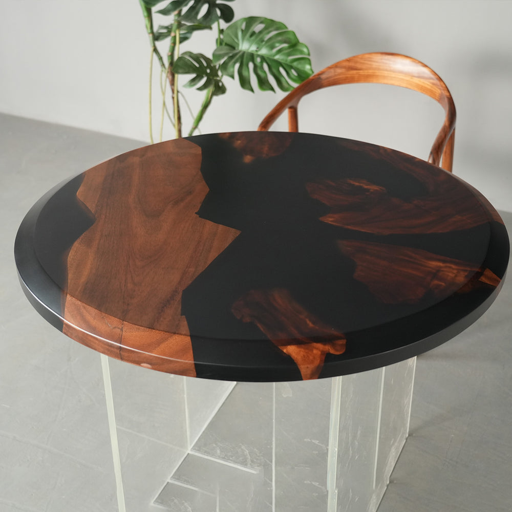 Modern epoxy resin dining table featuring natural walnut wood grain