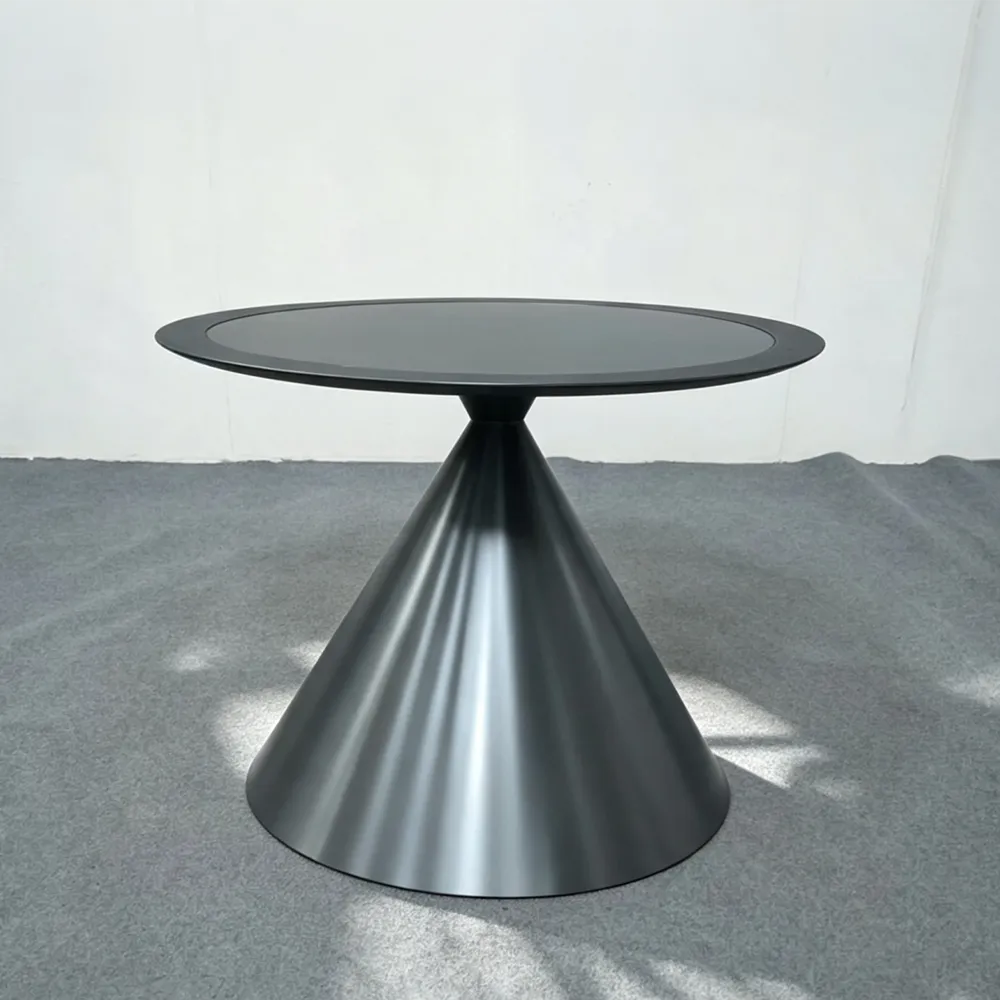 Sculptural cone pedestal metal table base with sleek black finish and wide circular support, 28 inches high