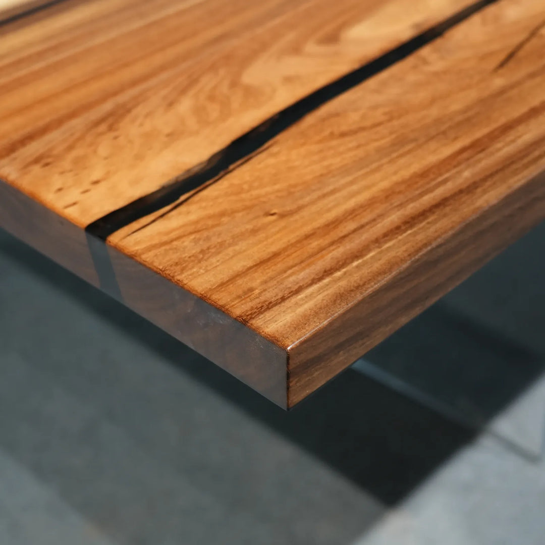 Seawavetable-close-up-walnut-sapwood-edge-and-black-epoxy-river-detail