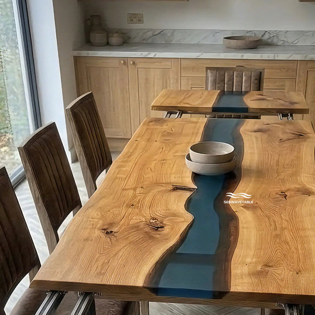 Seawavetable‑Black walnut wood grain texture detail on expandable dining table, paired with flowing blue epoxy river in straight‑edge design