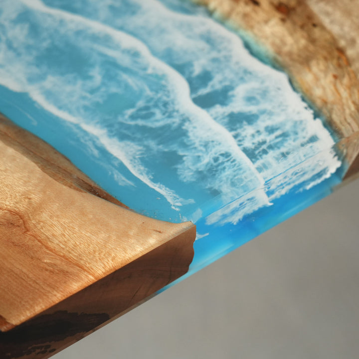 Straight line epoxy table with crystal blue river design