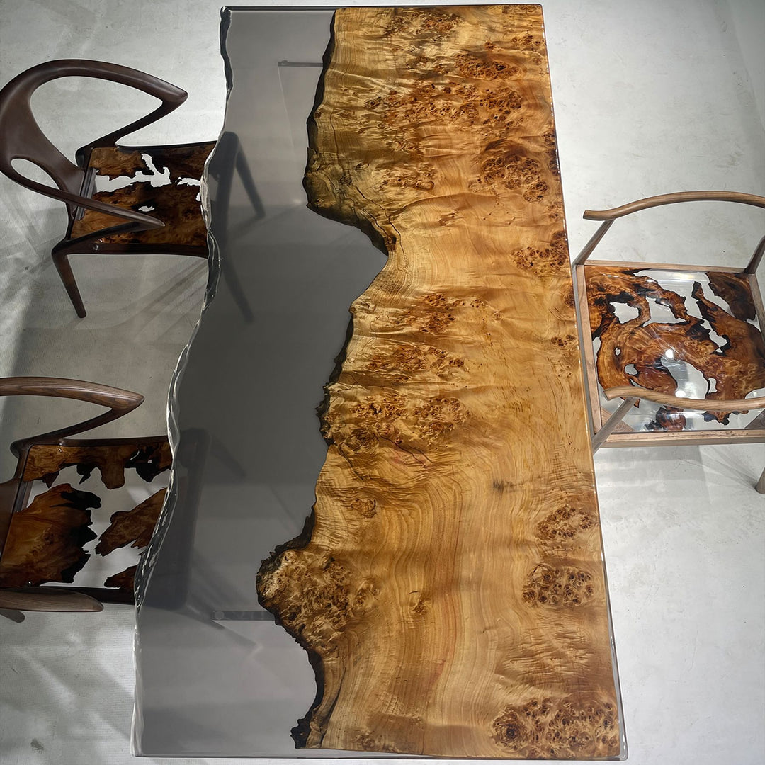 Striking live - edge poplar wood resin table with matching chairs