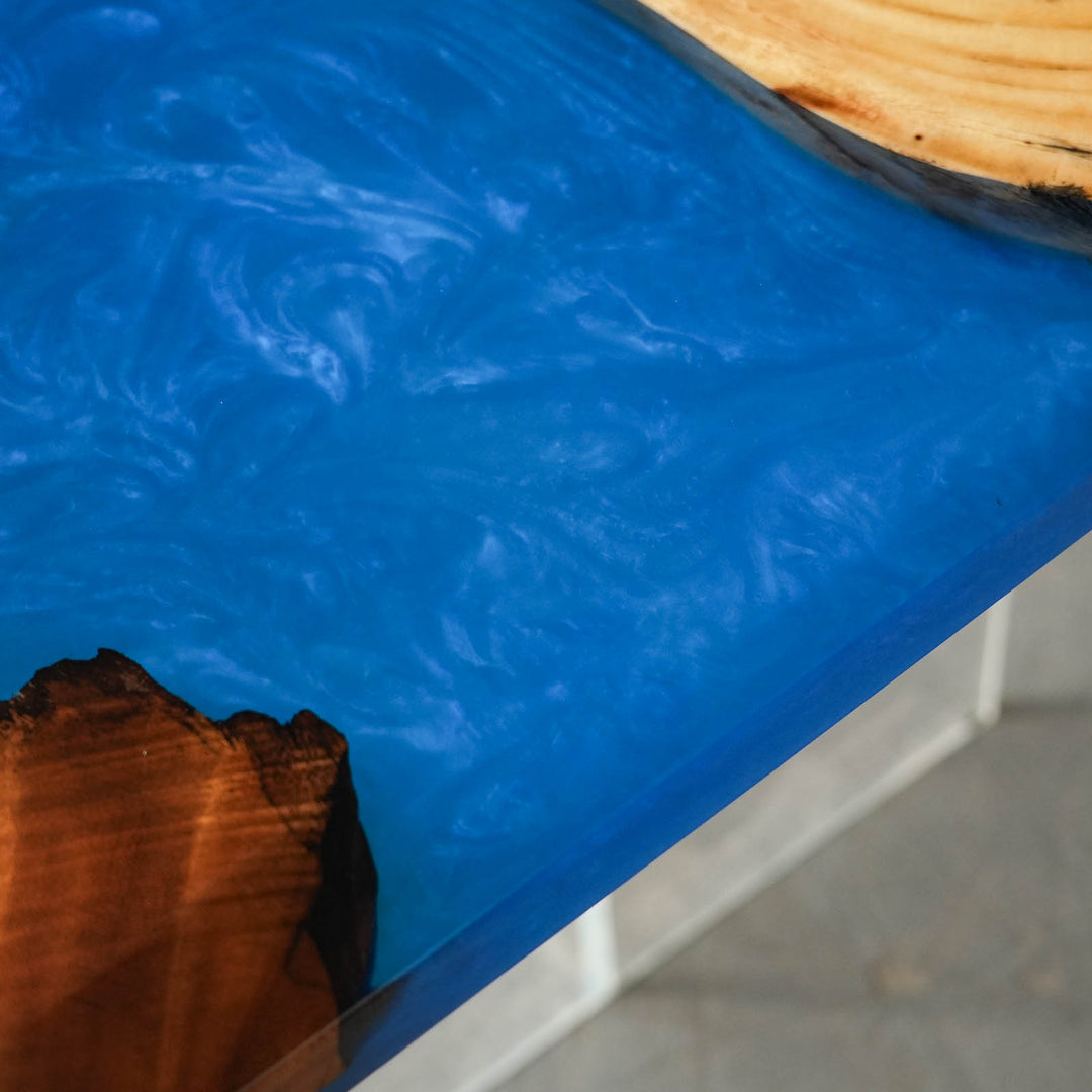 Close-up of custom walnut dining room table top featuring glossy epoxy table details, natural grain variation, and polished finish - SeaWaveTable