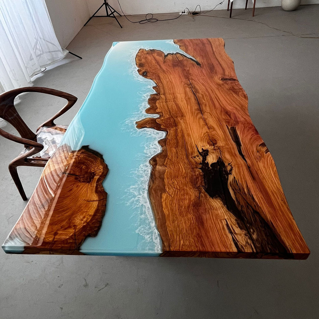 Custom wood slab desk with flowing epoxy resin details