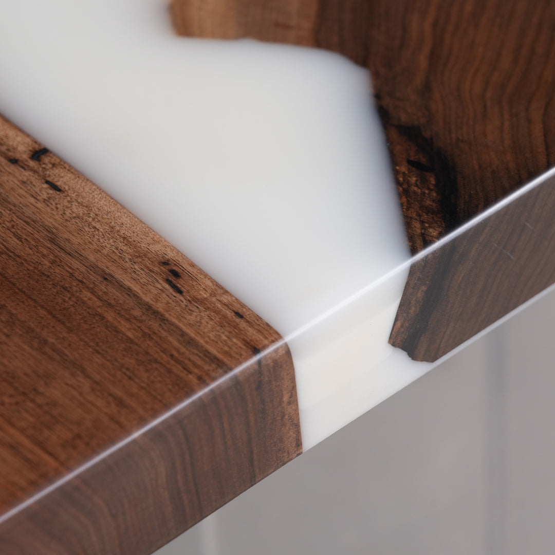 Epoxy river table with straight edges, perfect as a modern dining table