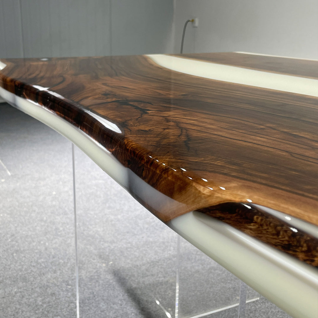 Wooden table with a glossy finish on a gray floor.