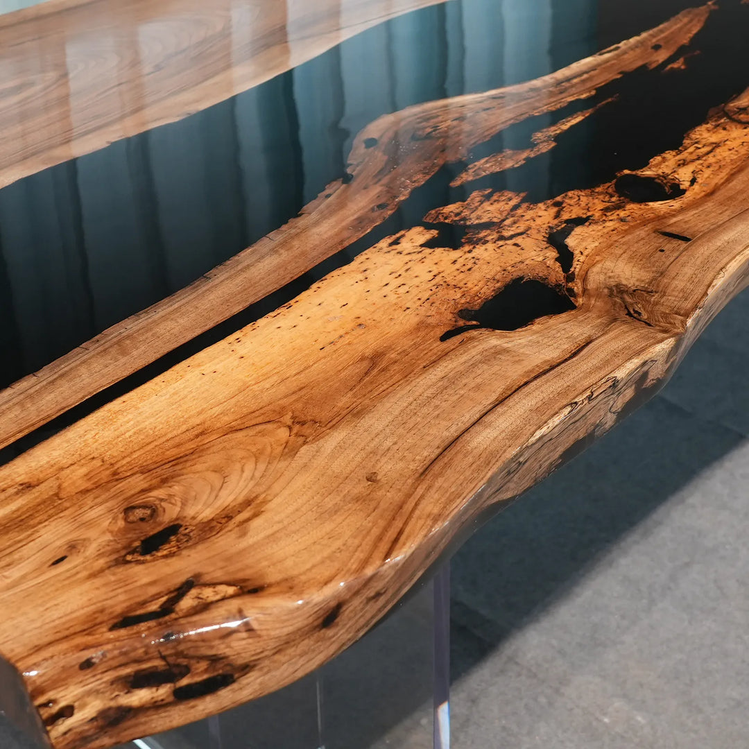 Wide black epoxy river dining table with natural Black Walnut by SeawaveTable