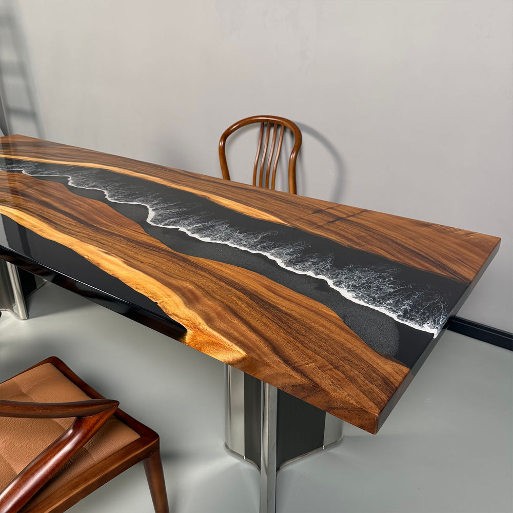 Straight edge walnut table with black epoxy resin and white wave design