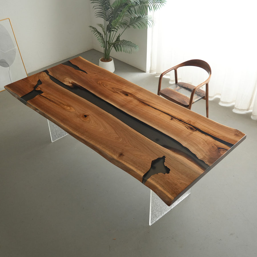 High-end walnut meeting table with semi-transparent black epoxy and live edges