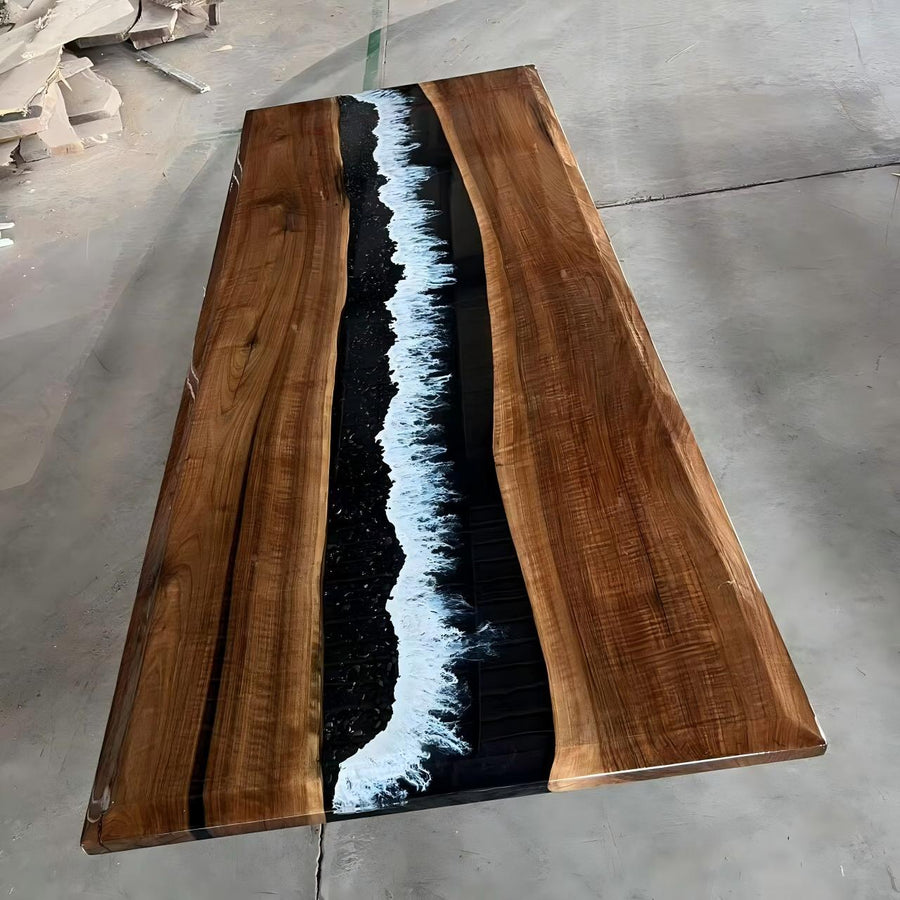 Raw Wood table with a black and white river design dining table.