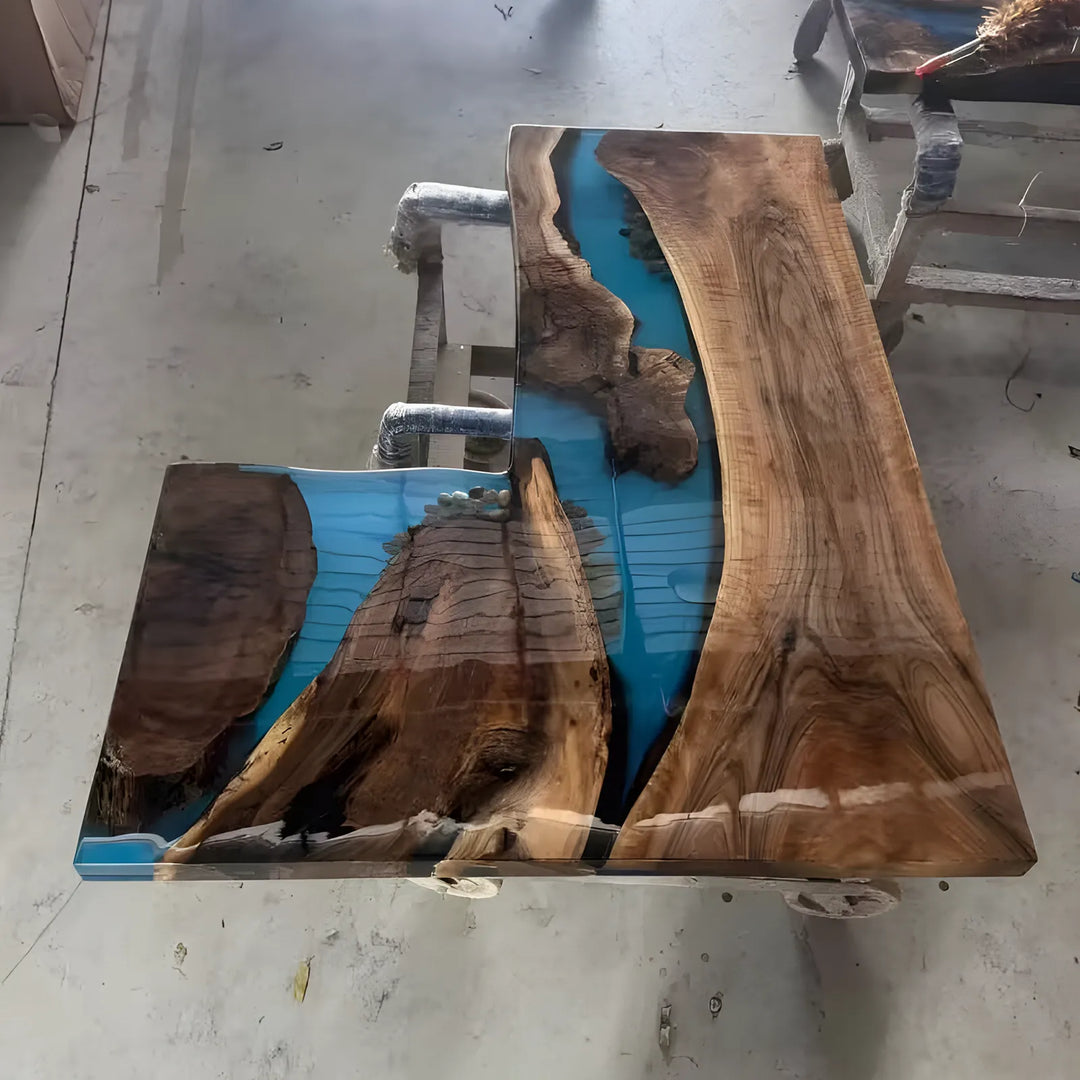 Black Walnut epoxy desk with natural stone embedded in blue resin