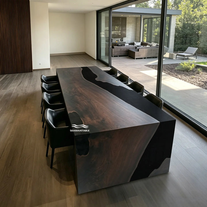 Minimalist interior with black walnut epoxy river table and clean grain surface