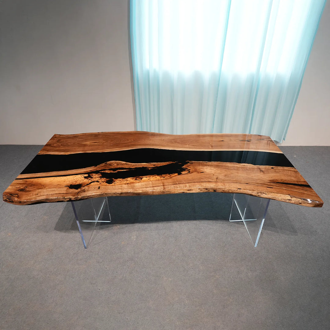 Black Walnut dining table with an organic black epoxy river by SeawaveTable