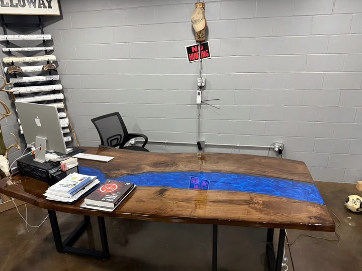 Close-up of black walnut live edge with glossy epoxy surface — seamless fusion of natural wood texture and ocean-blue resin brilliance.