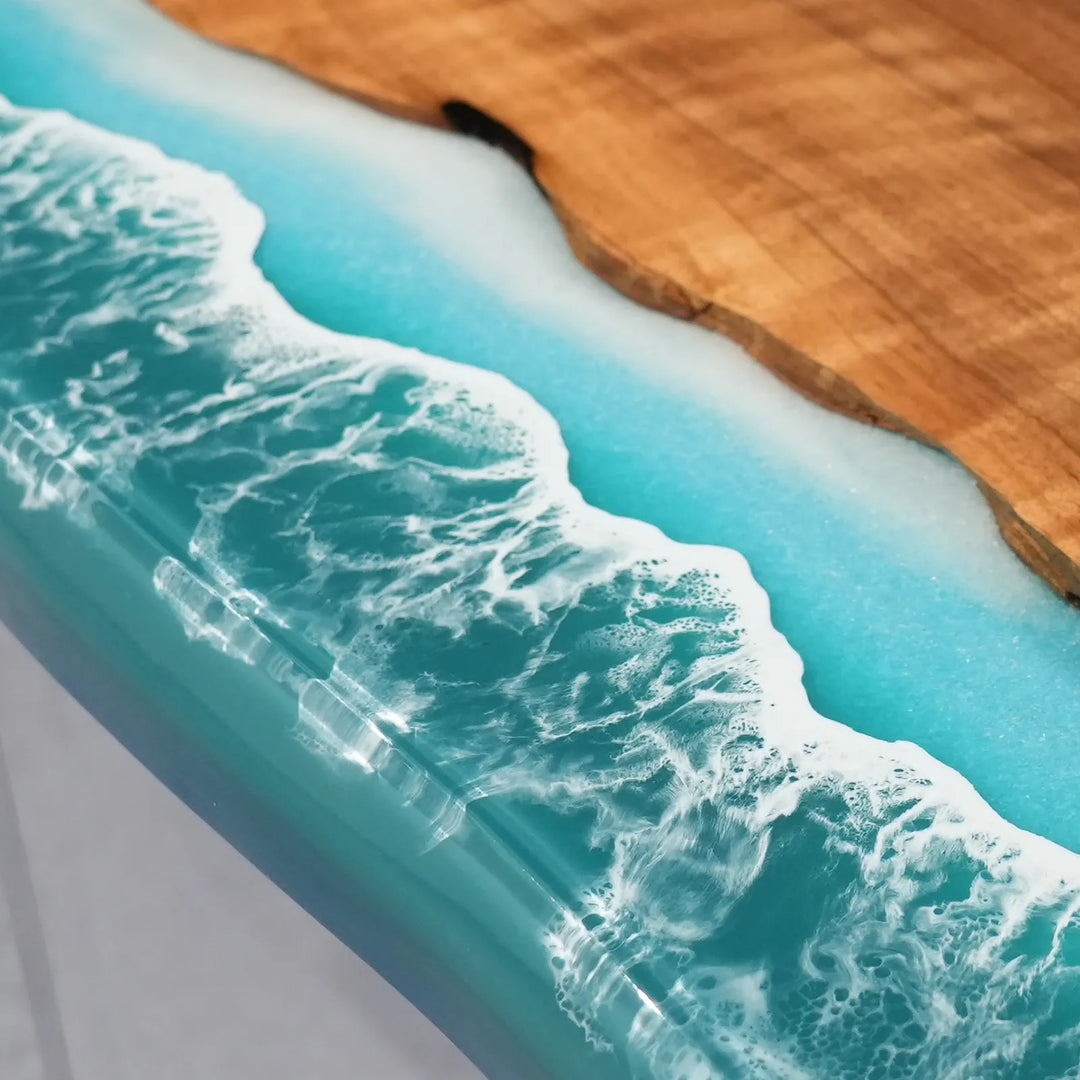 Natural Black Walnut grain beside blue ocean wave epoxy by SeawaveTable
