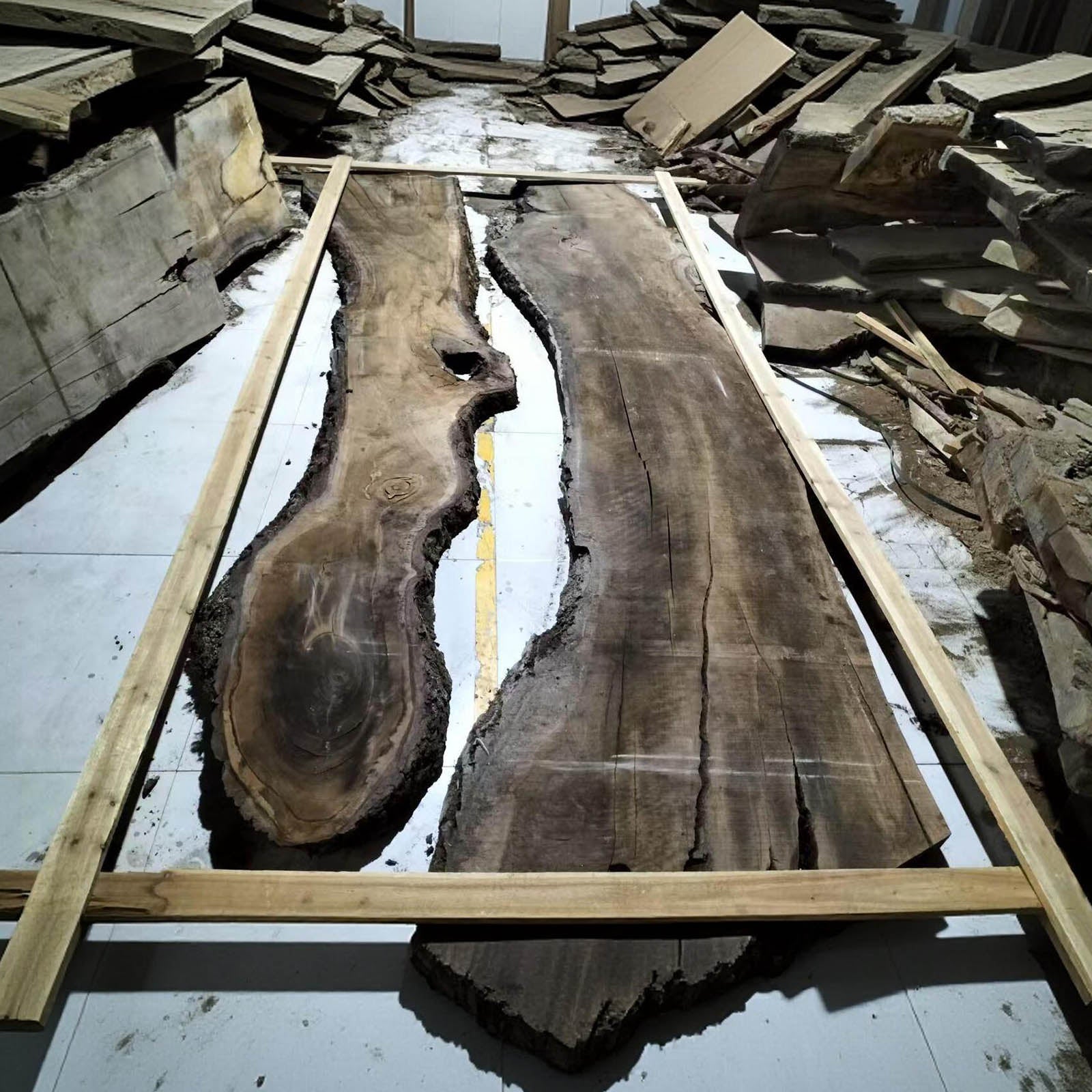 Handcrafted black walnut dining table with swirling ocean blue epoxy river, luxury solid wood furniture.