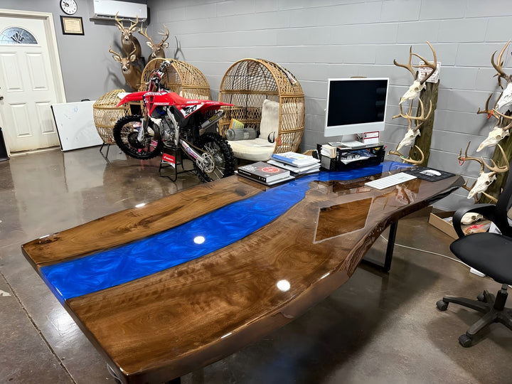 Black walnut live edge epoxy table with Swirling Ocean Blue resin and built-in LED lighting, featuring a full gloss surface and artistic ocean-inspired glow.