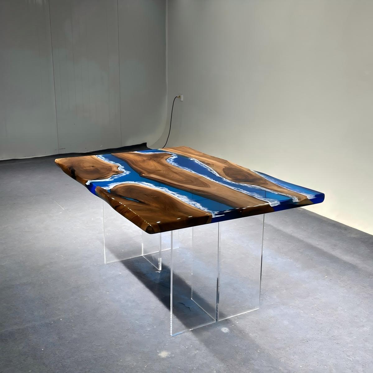 Custom black walnut table with deep blue transparent resin and white ocean wave details