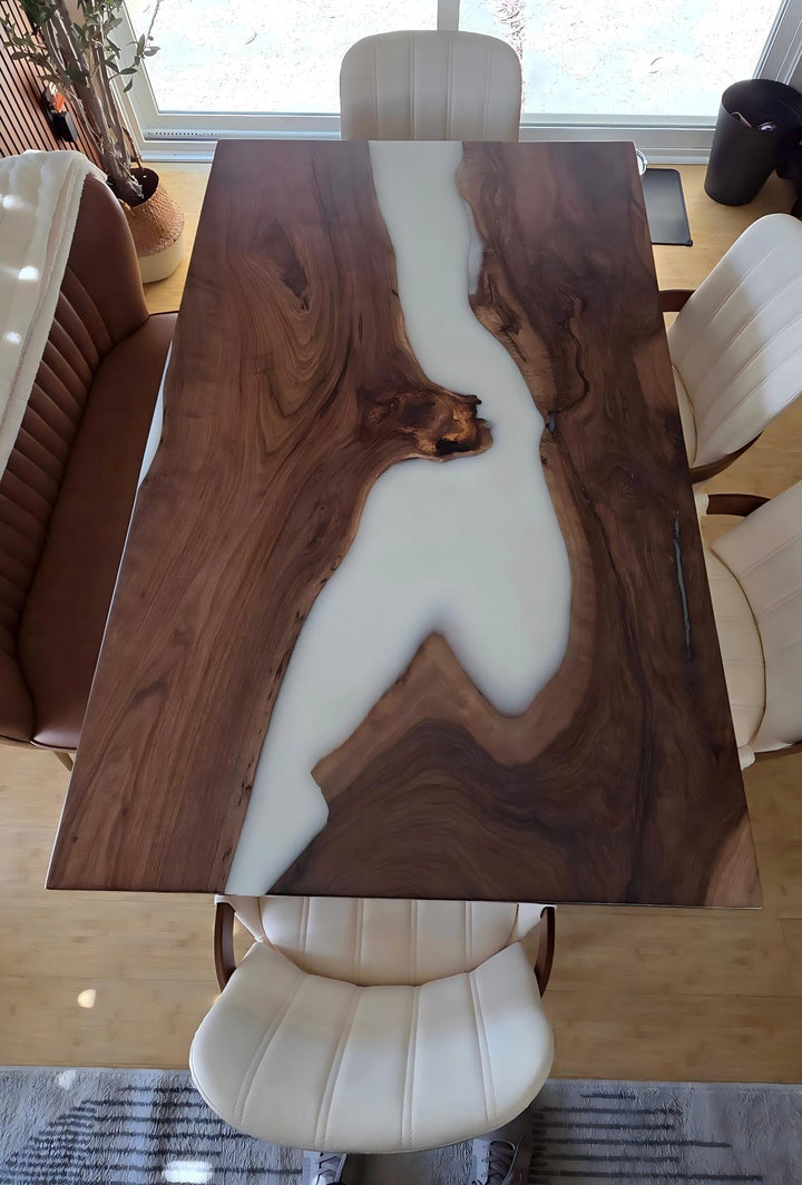 Close-up of black walnut wood grain blending seamlessly with white matte epoxy resin — refined craftsmanship for a subtle, timeless look.