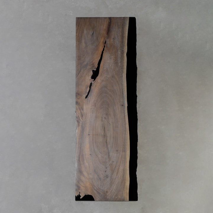 Large boardroom table featuring premium walnut and epoxy