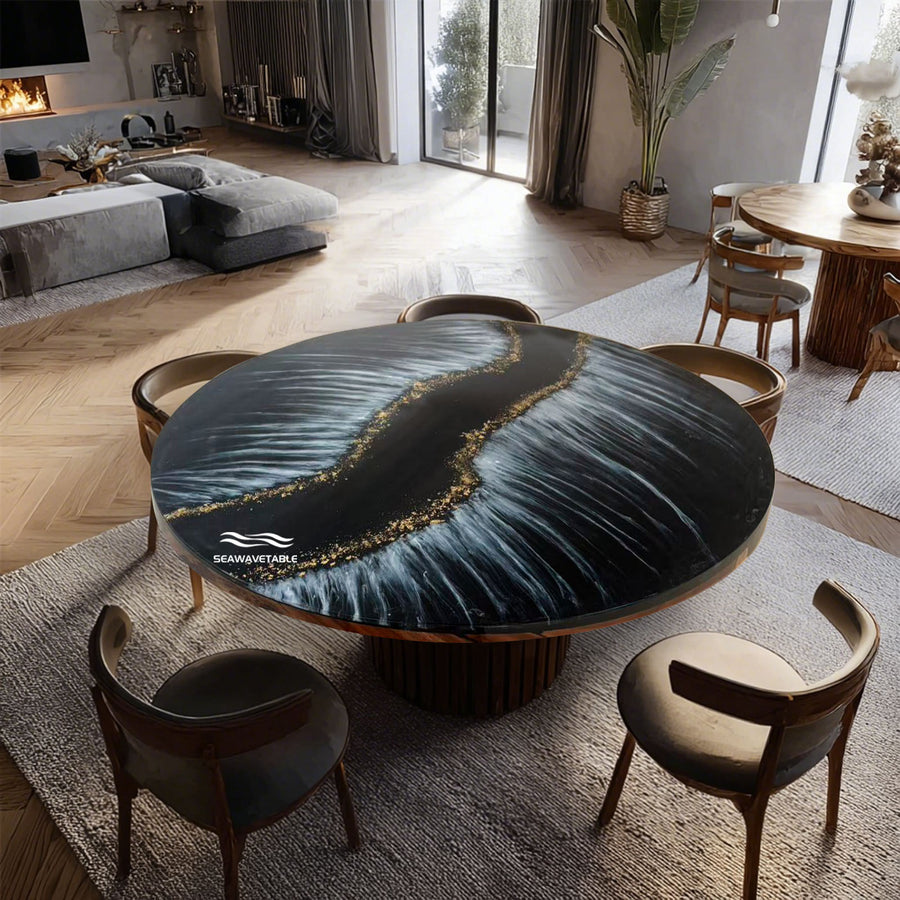 Black epoxy resin round dining table with white wave pattern and gold edge on walnut wood base.