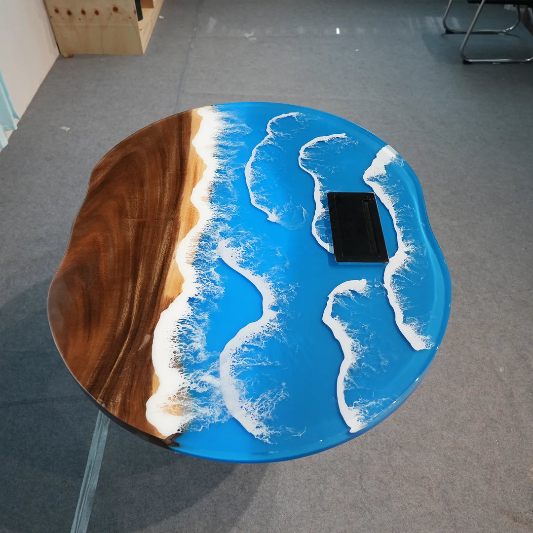 Blue and white ocean wave epoxy alongside natural Walnut by SeawaveTable