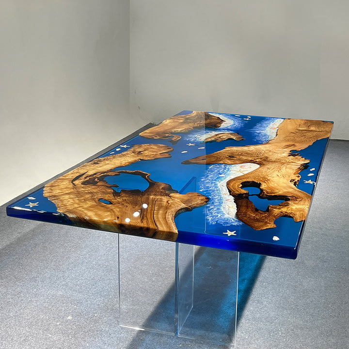 Table with blue resin and wood design on a gray floor