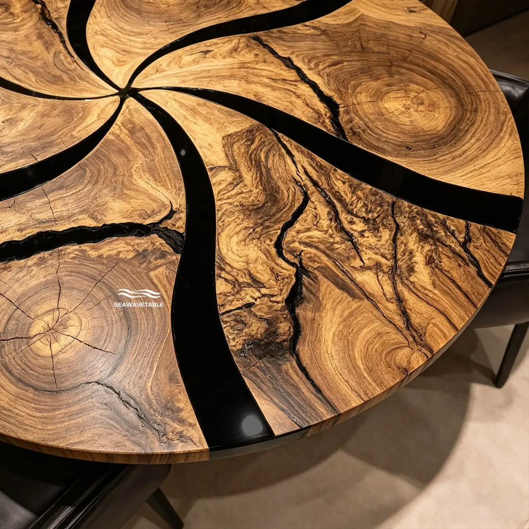Angled view of custom round black epoxy resin dining table CRT-333