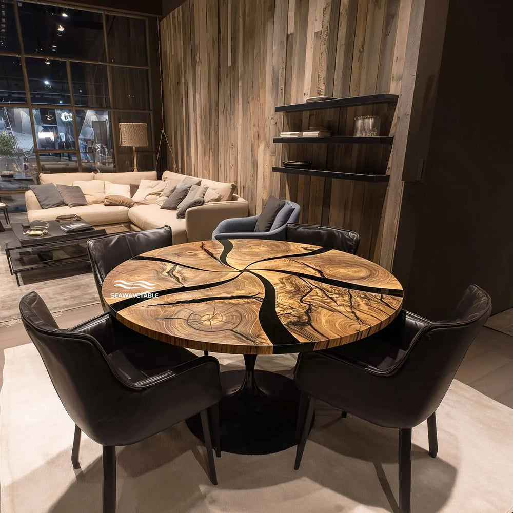 Top view of round black epoxy resin table CRT-333 showing spliced wood pattern