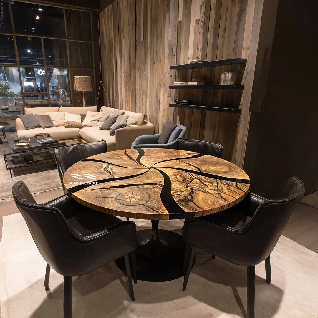 Top view of round black epoxy resin table CRT-333 showing spliced wood pattern