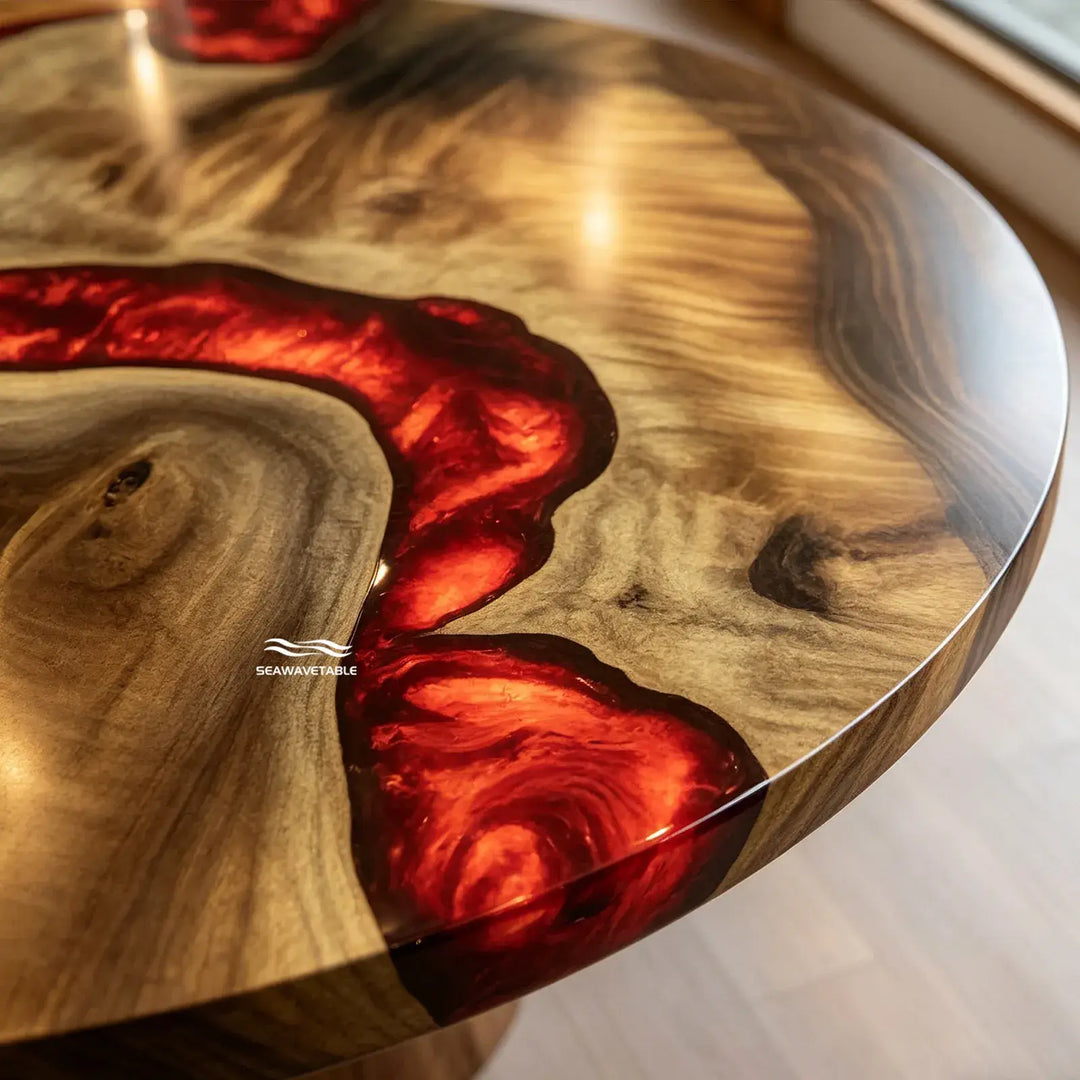 Angled view of custom round lava epoxy table CRT-334 with red resin