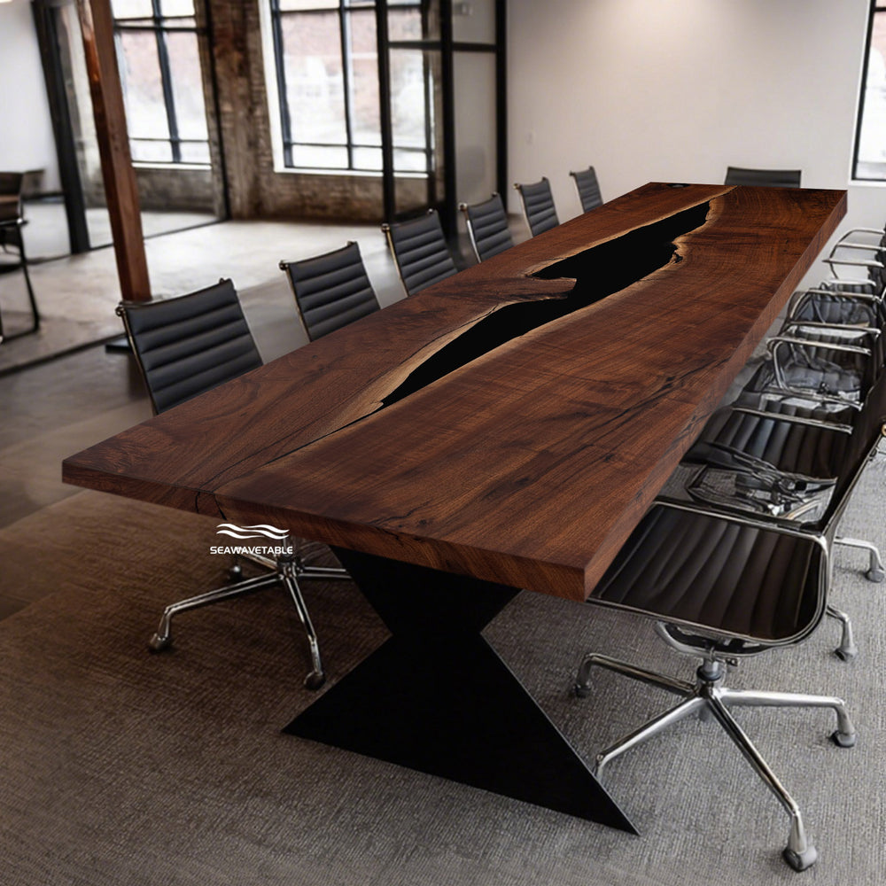 Side view of handcrafted black walnut and resin boardroom table for corporate meeting rooms