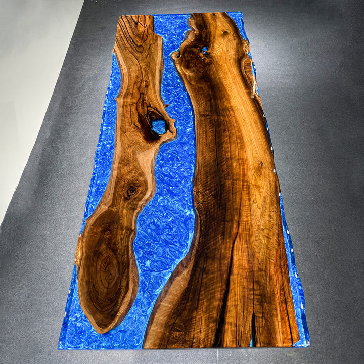 Custom black walnut epoxy tabletop with bold black resin