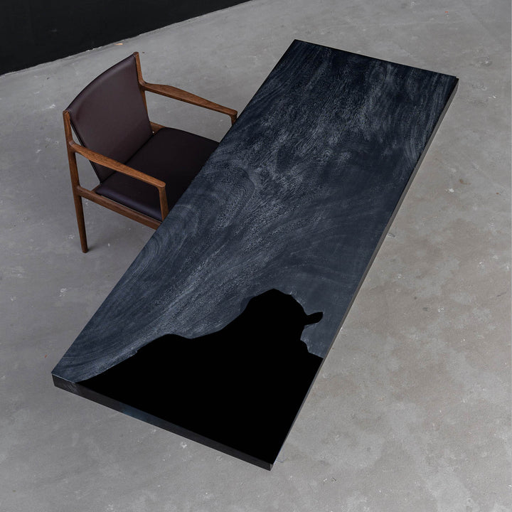 Black and white epoxy design on premium walnut tabletop