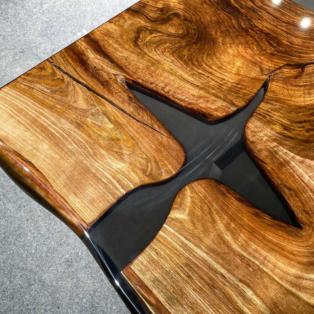 Rectangular modern wood and resin table with live edge detail