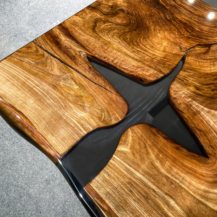 Rectangular modern wood and resin table with live edge detail