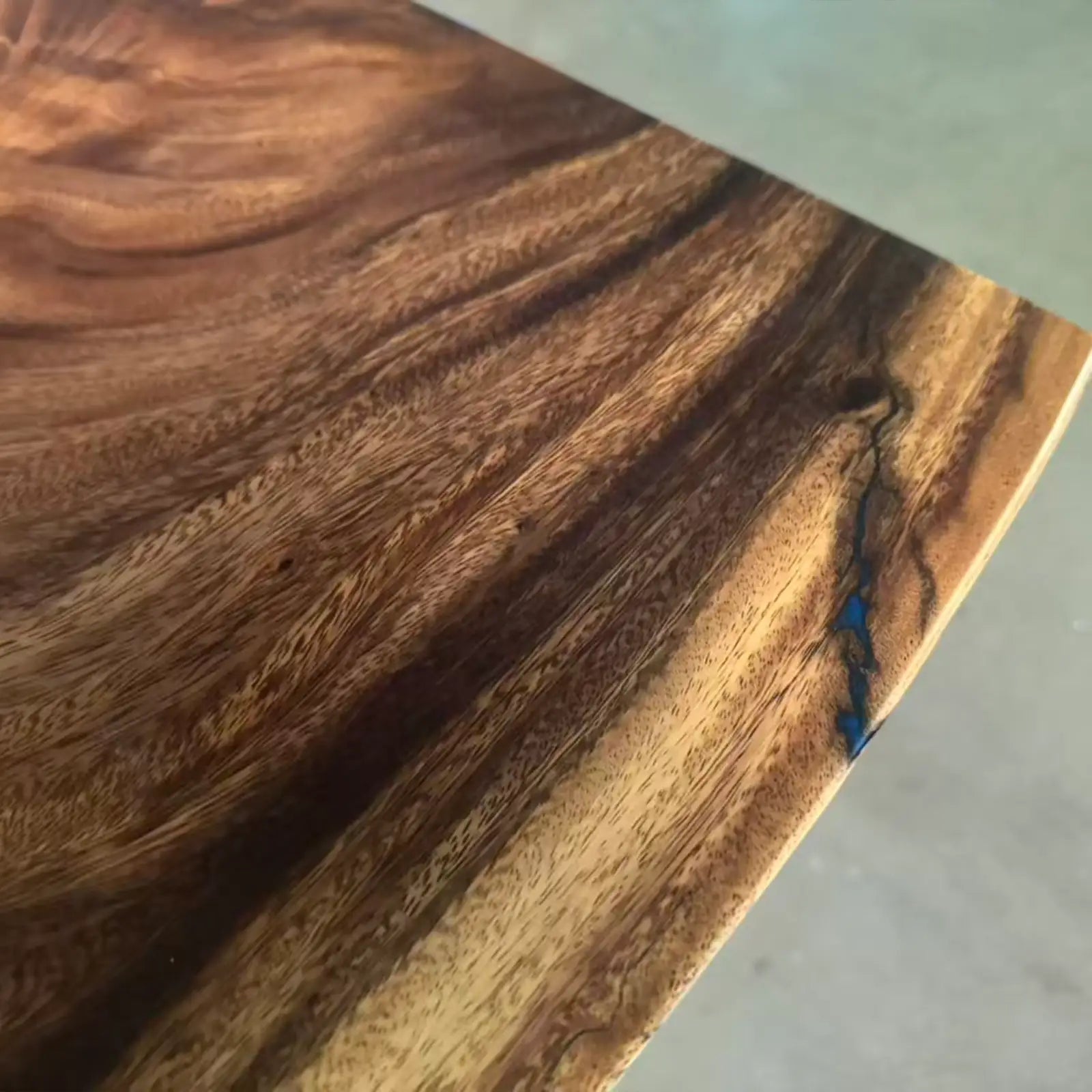 Close-up of a walnut surface with a visible grain pattern
