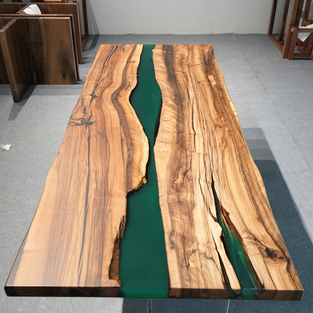 Deep Teal epoxy river between natural Black Walnut slabs by SeawaveTable