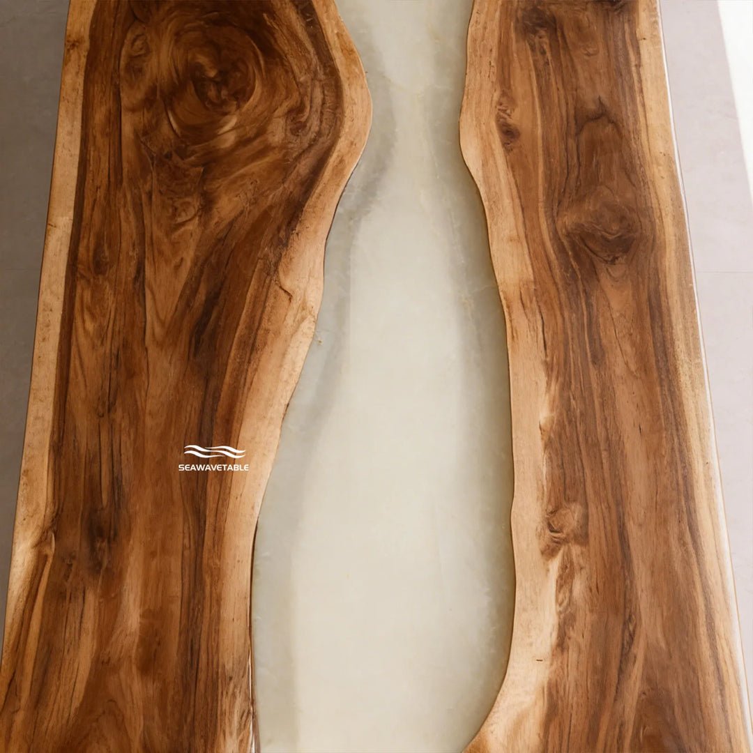 Designer black walnut river table in a luxury modern home interior