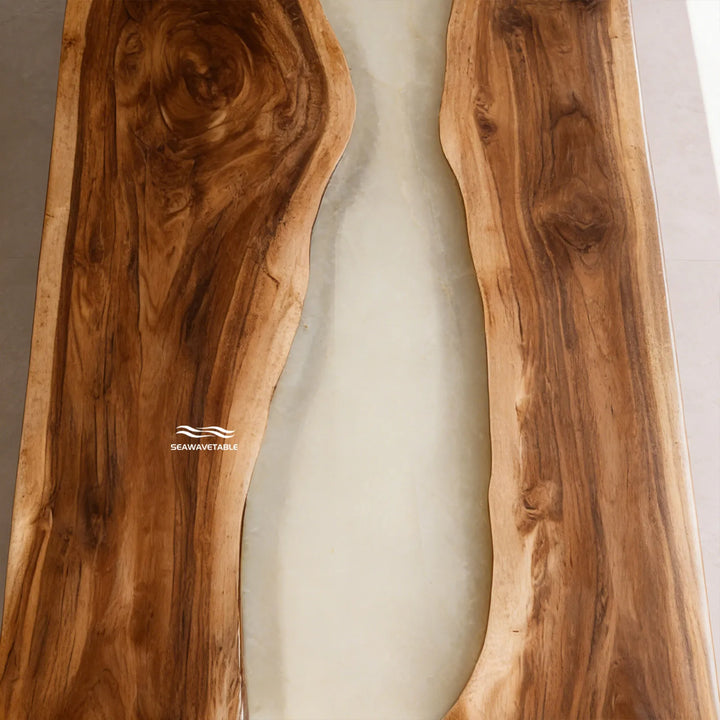 Designer black walnut river table in a luxury modern home interior