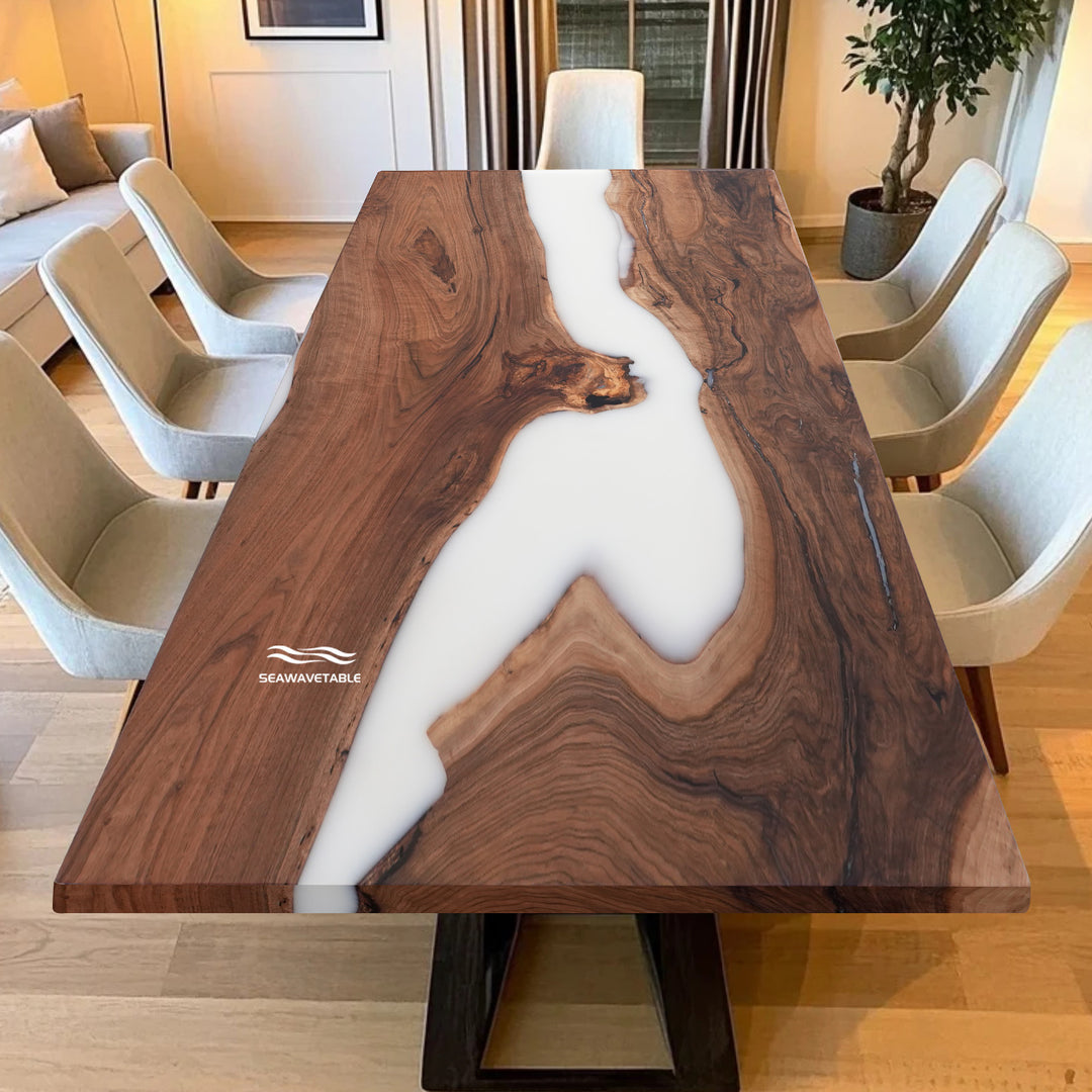 Contemporary dining room table featuring white epoxy and straight edge walnut