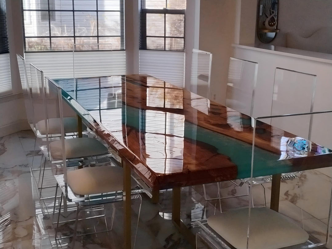 Custom blue resin river table in a modern coastal interior