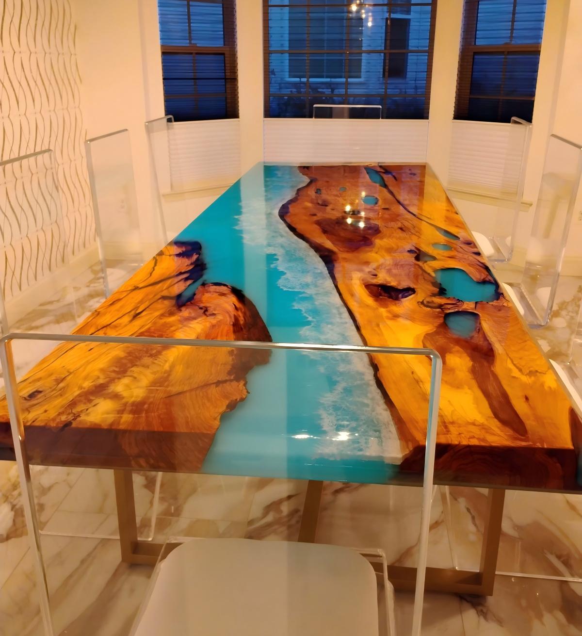 Golden Camphor dining table with Ocean Serenity blue resin in a bright Baltimore home