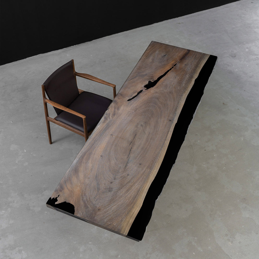 Custom walnut conference table with artistic epoxy design