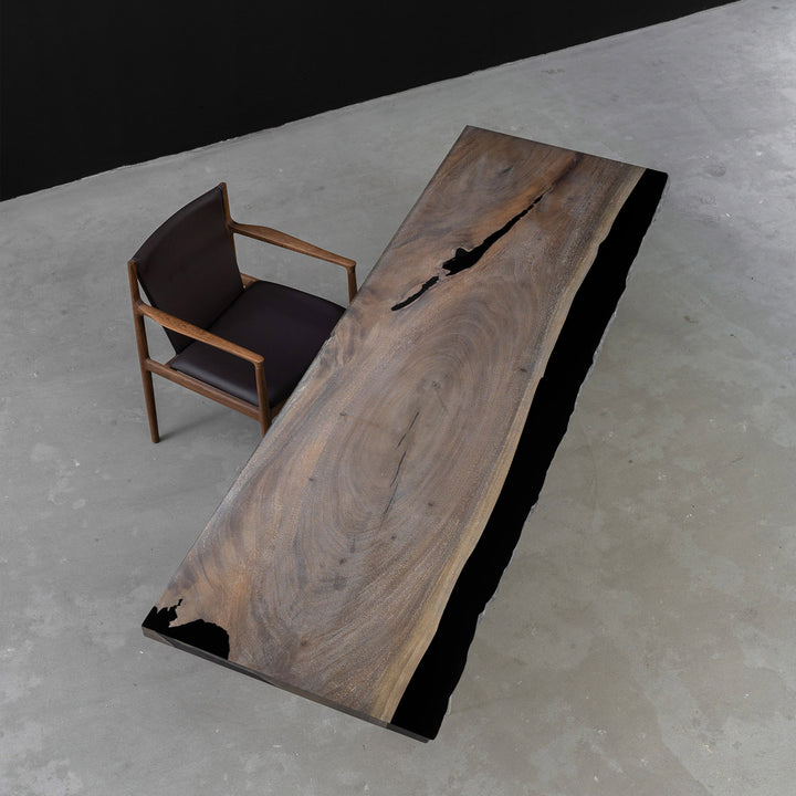 Custom walnut conference table with artistic epoxy design